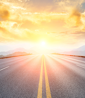 highway leading to the sunset