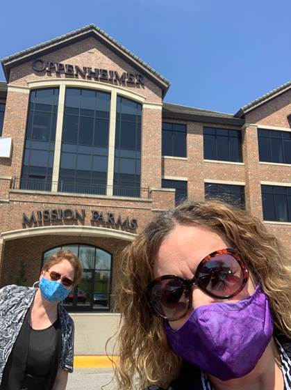 Christel Good and Marla Hart sporting their homemade mask outside