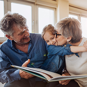 Grandparents spending time with grandchild