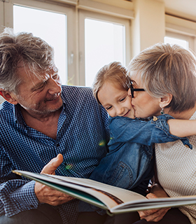 Grandparents spending time with grandchild