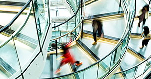 business people walking down a staircase