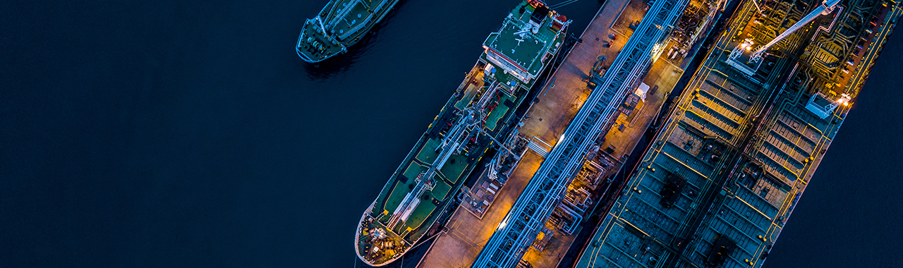 cargo ships at night