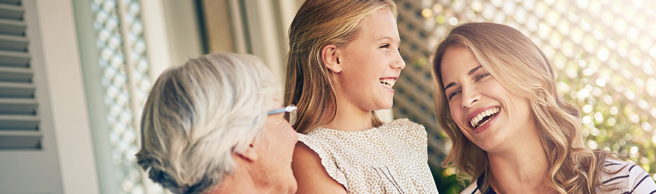 three generations of women laughing