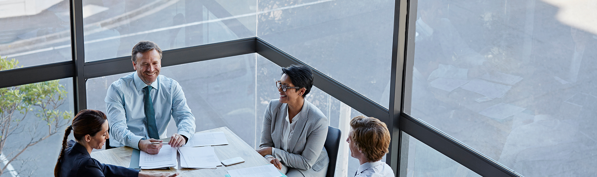 business people have a meeting around a table