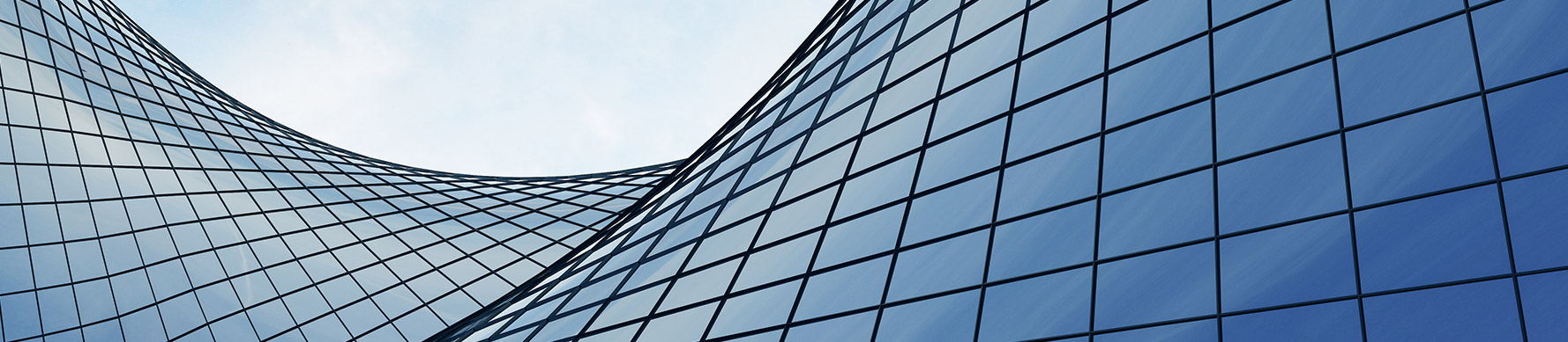 View of the clouds reflected in the curve glass office building. 3d rendering 