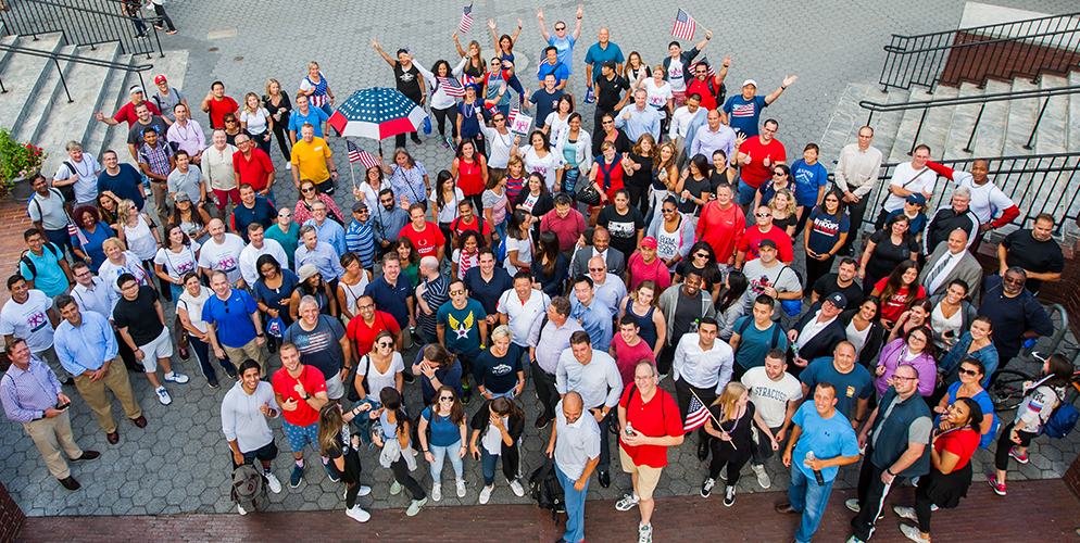 firm employees cheering as a group