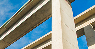 view from bottom of concrete highway structure