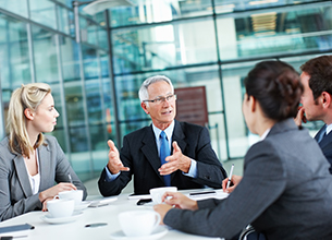 business people having a meeting around a table