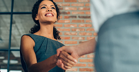 woman shaking hands