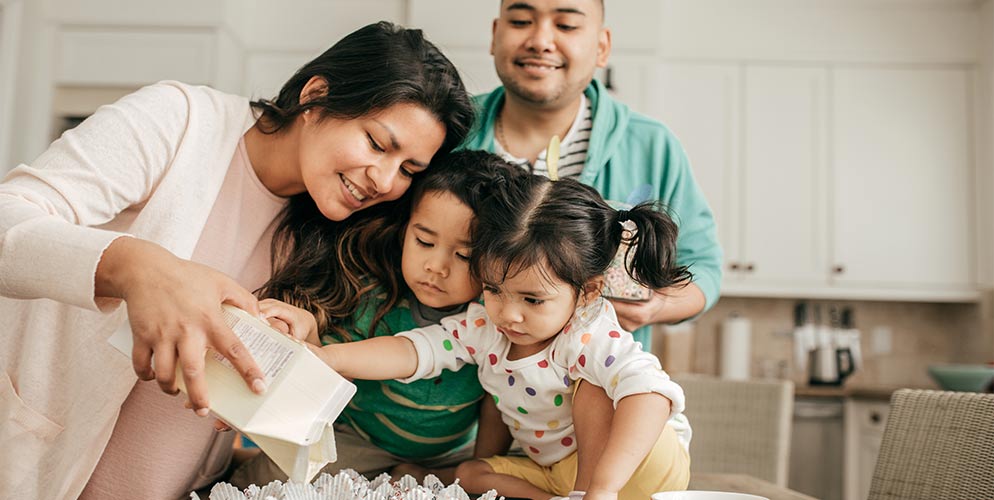 hispanic family baking together