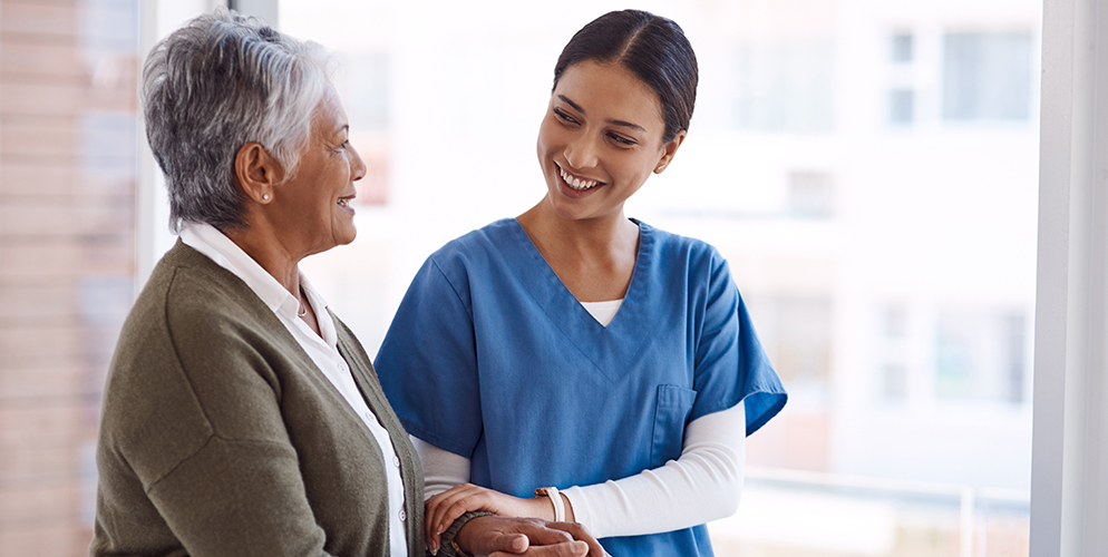 older woman and nurse