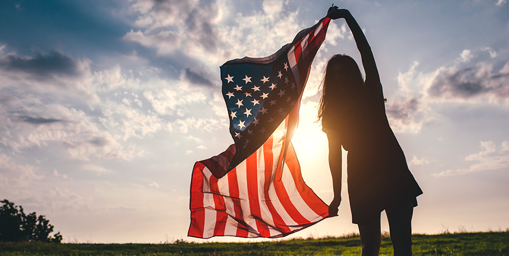 woman holding american flag