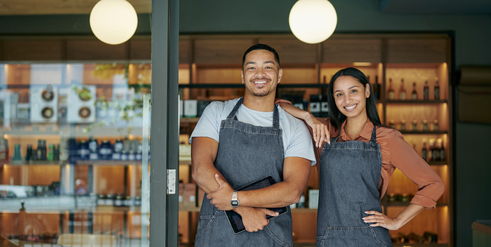business owners at storefront