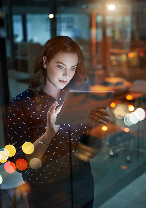 woman looking at ipad