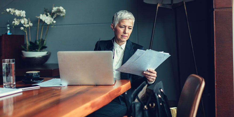woman looking at papers