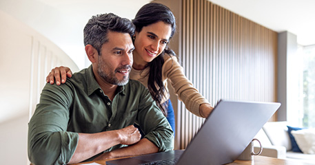 couple looking at laptop