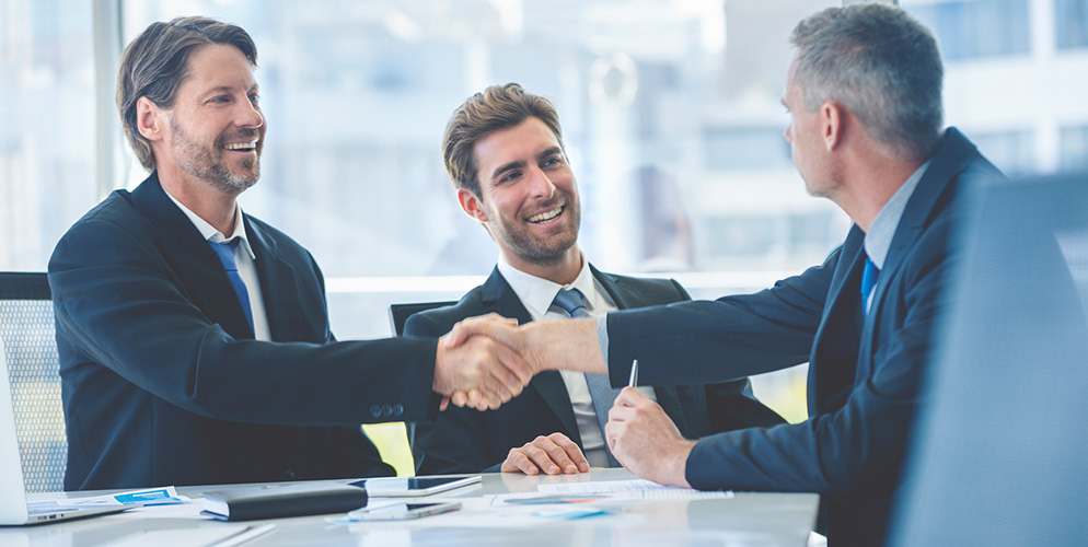 men shaking hands