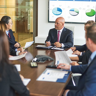 Business people looking at documents